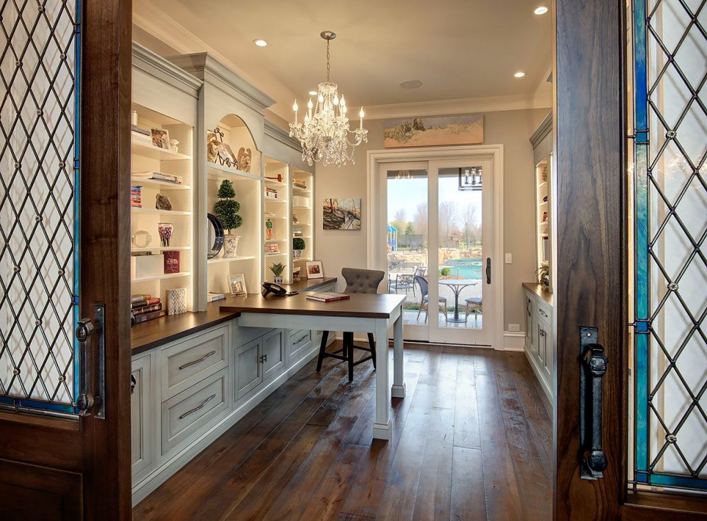 home office with swimming pool in background