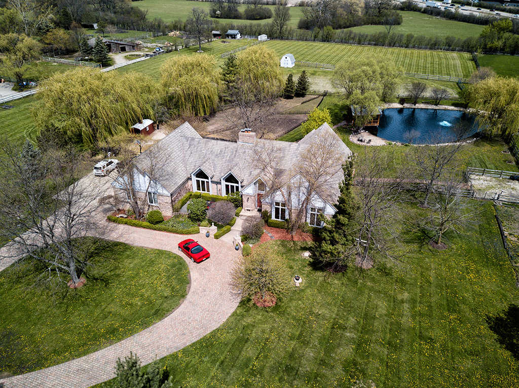 Drone aerial view of house land and water