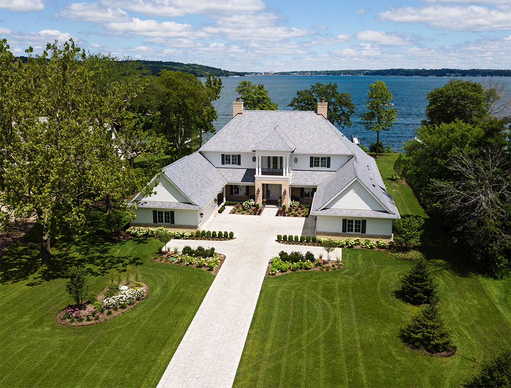 drone aerial view of house on lake